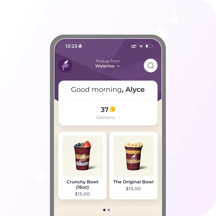 Mobile app screen showing a greeting to Alyce with 37 OAKoins, two smoothie bowl options priced at $15: Crunchy Bowl with berries and The Original Bowl with banana slices.